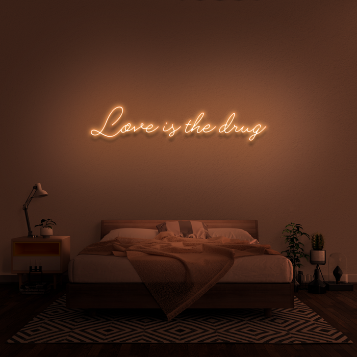 'Love Is The Drug' Neon Sign